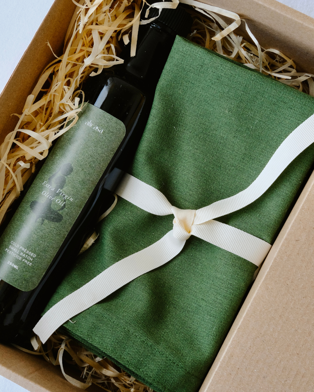 cold-pressed olive oil and green linen napkins gift set cape town